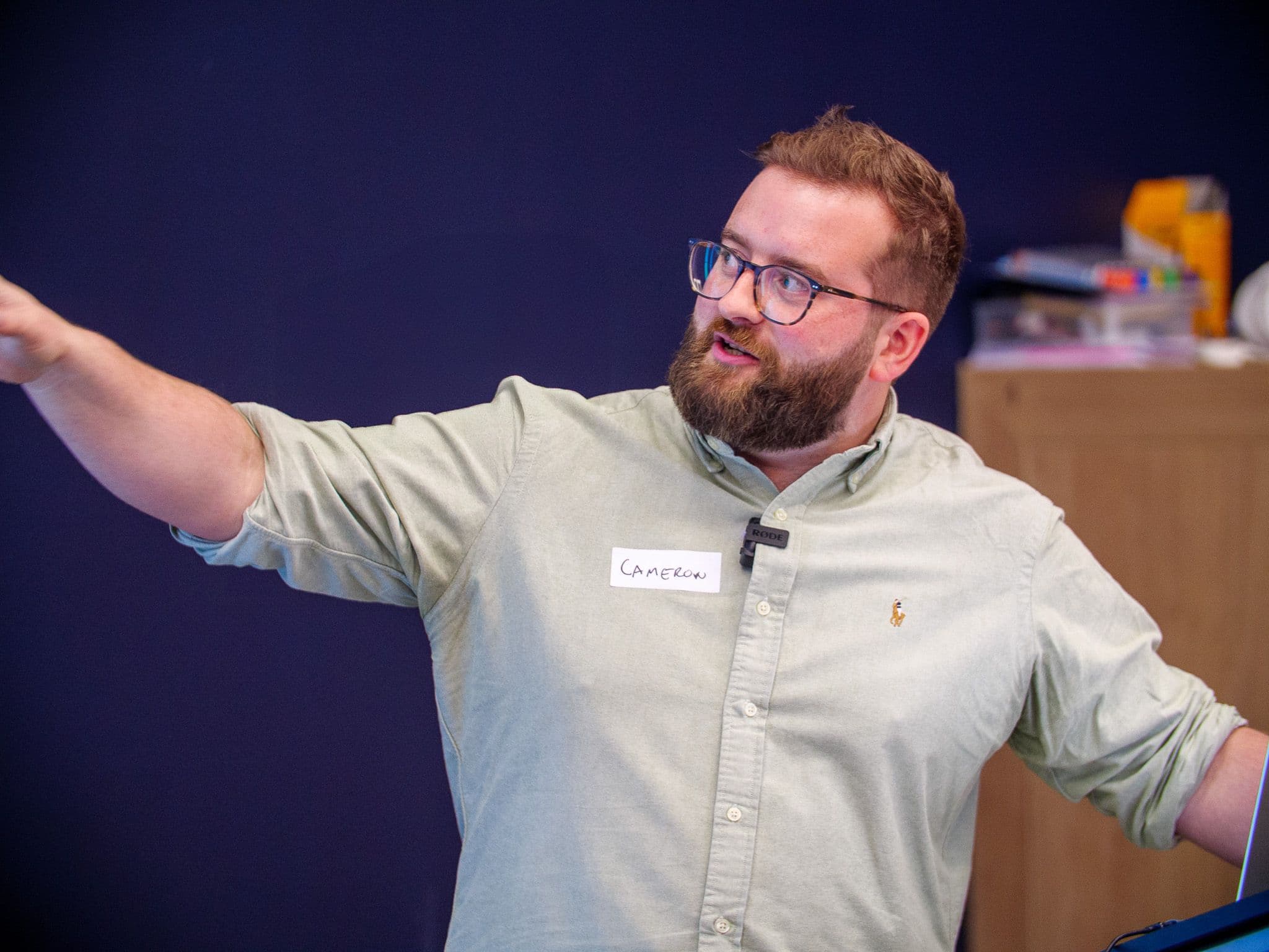 Cameron Blackwood speaking at EdinburghJS meetup, presenting to an engaged developer audience